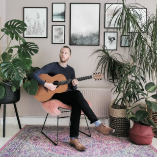 guitarist in his room